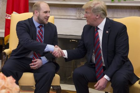 U.S. President Donald Trump shake hands during a meeting with Joshua Holt after his return to the U.S. at the White House on May 26, 2018 in Washington, DC. Holt, who had been imprisoned in Venezuela for two years, was released following diplomat efforts by the Trump and Obama administrations. (Photo by Chris Kleponis - Pool/Getty Images)