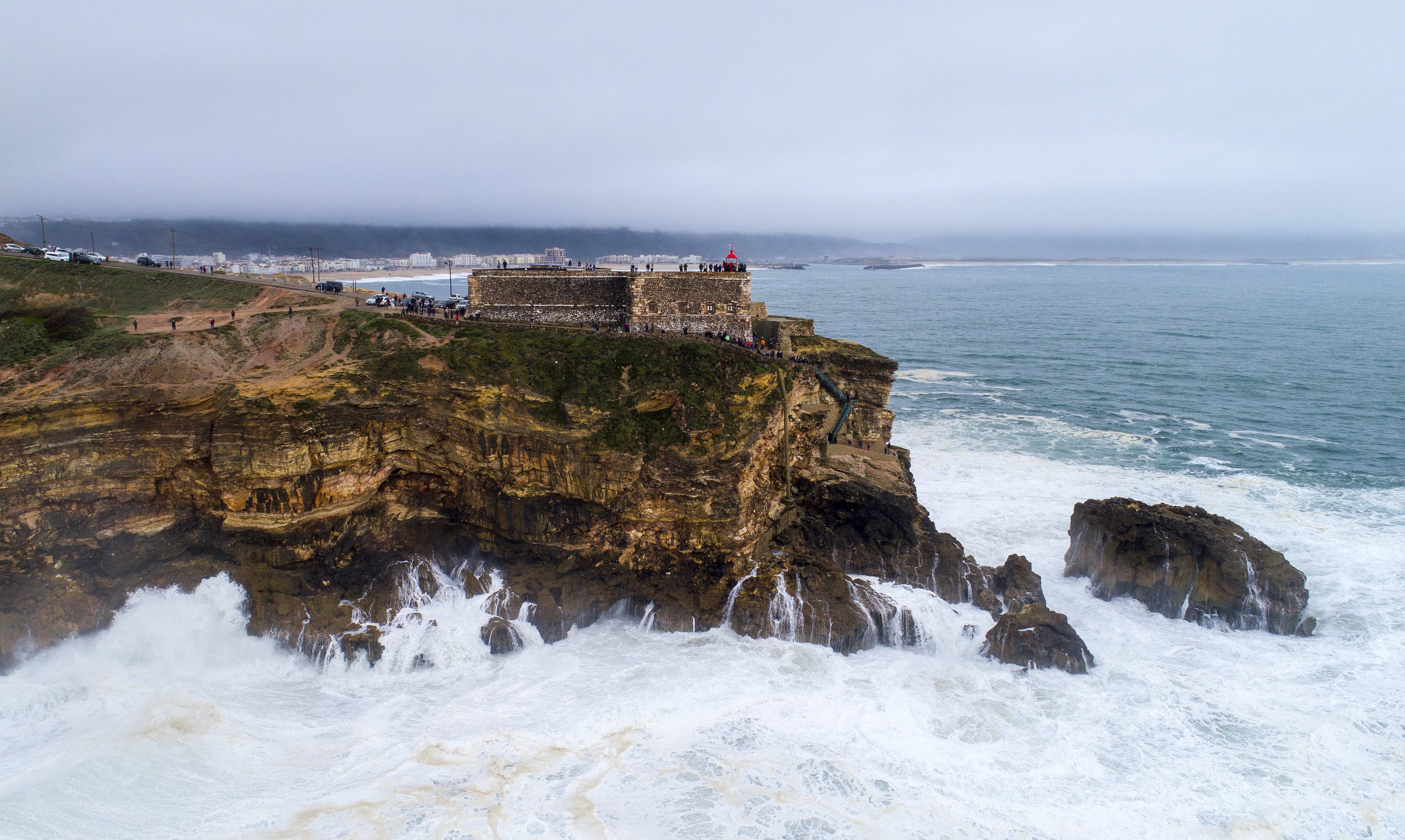 General view of Nazare lighthouse during a surf session at Praia do Norte  on January 3, 2018 in Nazare, Portugal. (Octavio Passos/Getty Images)