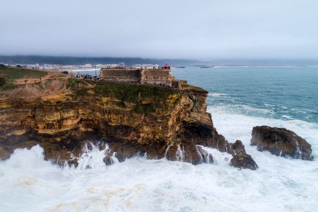 General view of Nazare lighthouse during a surf session at Praia do Norte  on January 3, 2018 in Nazare, Portugal. (Octavio Passos/Getty Images)