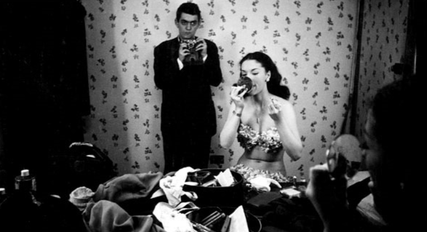 Stanley Kubrick was a LOOK magazine photographer when he caught himself in the mirror of Rosemary Williams, a showgirl, in 1949. LOOK Magazine Collection, Library of Congress, Prints & Photographs Division. (Courtesy of Wikimedia Commons)
