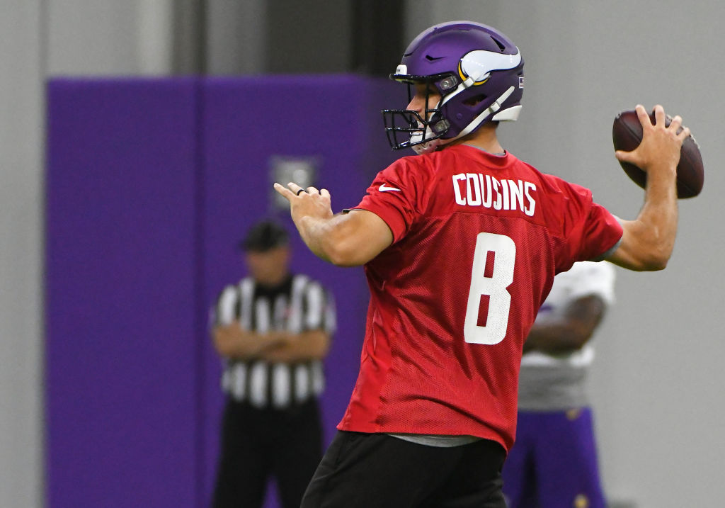 Minnesota Vikings quarterback Kirk Cousins (8) makes a pass during Optional Team Activities on May 30, 2018 at Twin Cities Orthopedics Performance Center in Eagan, MN.(Photo by Nick Wosika/Icon Sportswire via Getty Images)