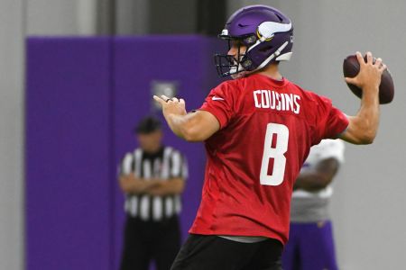 Minnesota Vikings quarterback Kirk Cousins (8) makes a pass during Optional Team Activities on May 30, 2018 at Twin Cities Orthopedics Performance Center in Eagan, MN.(Photo by Nick Wosika/Icon Sportswire via Getty Images)