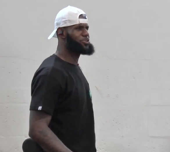 Screenshot of LeBron James watching his son play hoops. (VIA @SLAM_HS on Instagram)
