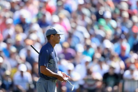 Tiger Woods of the United States checks his yardage book on the seventh green during the first round of the 2018 U.S. Open at Shinnecock Hills Golf Club on June 14, 2018 in Southampton, New York.  (Photo by Warren Little/Getty Images)