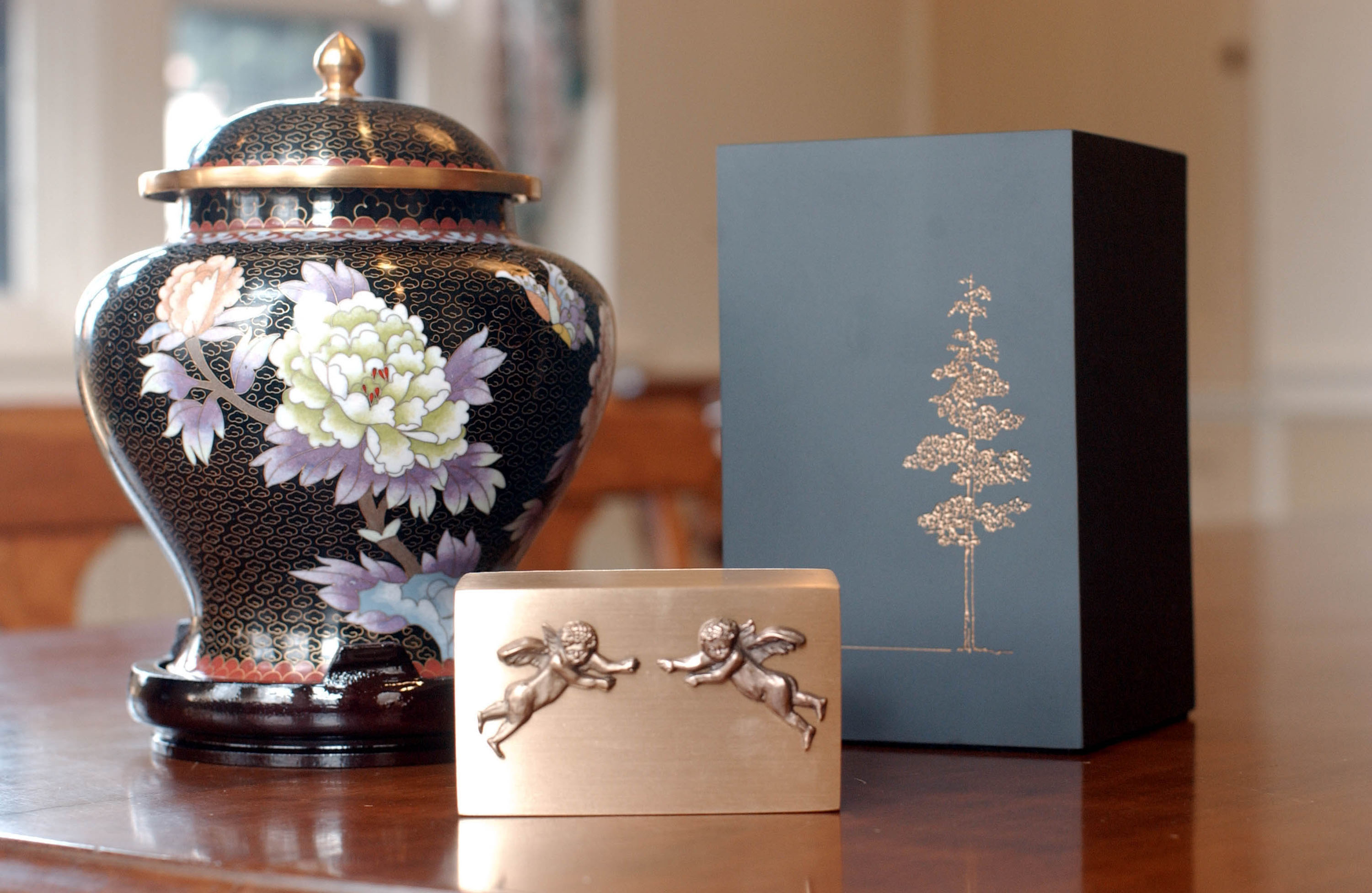 A selection of crematory urns available at Mount Auburn Cemetary is shown February 21, 2002 in Watertown, MA. The cemetary has been performing cremations for 100 years and does about 900 per year. (Photo by Darren McCollester/Getty Images)