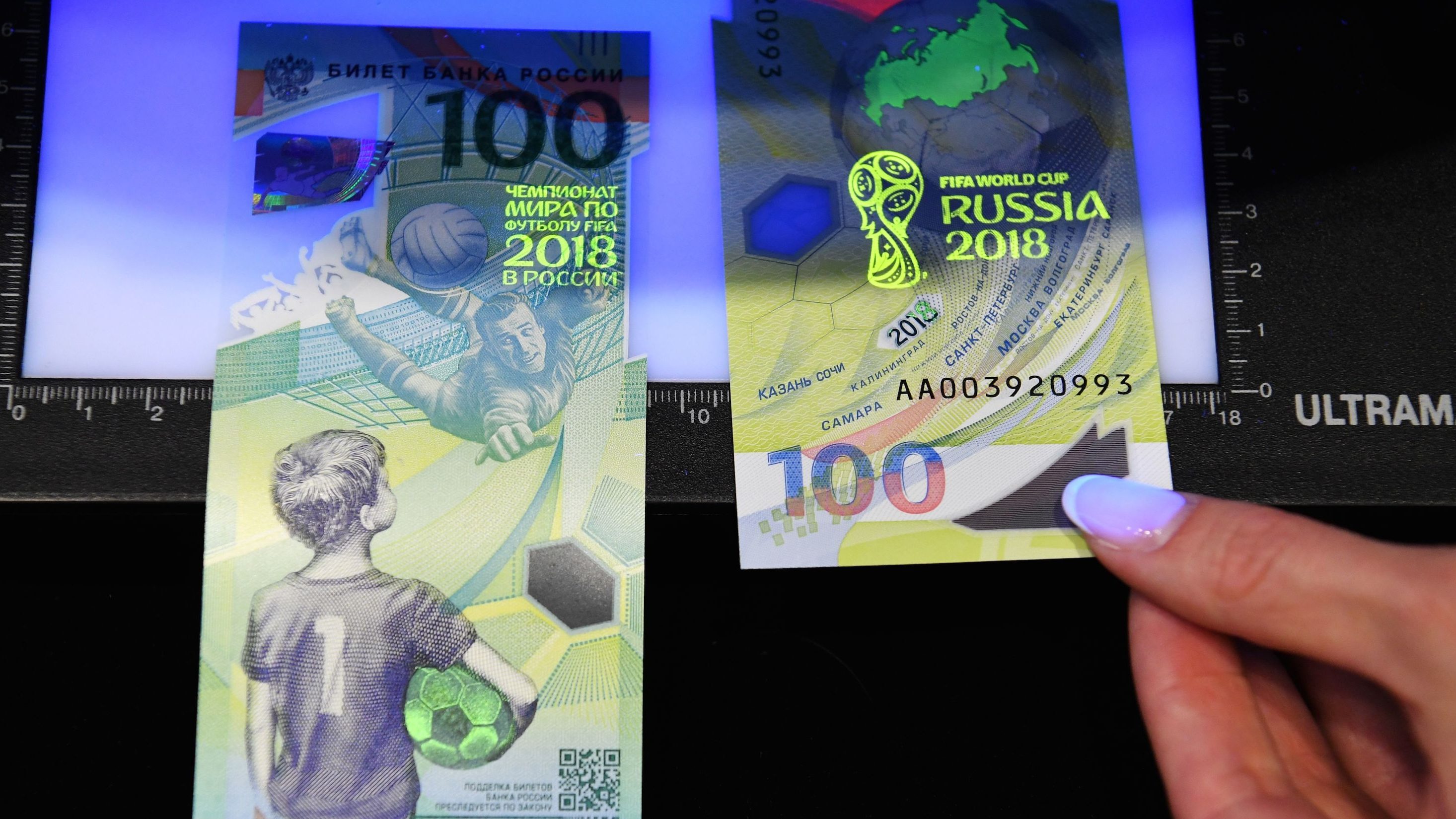 Picture of the commemorative 100-ruble banknote for the 2018 FIFA World Cup football tournament. (Kirill KUDRYAVTSEV / AFP / Getty Images)   
