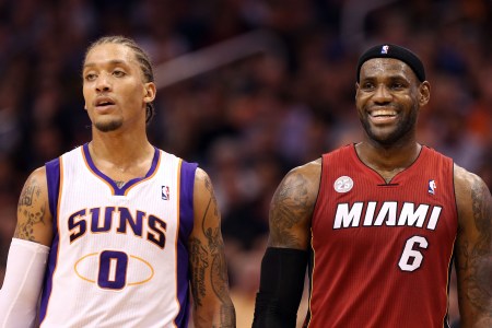 PHOENIX, AZ - NOVEMBER 17:  Michael Beasley #0 of the Phoenix Suns and LeBron James #6 of the Miami Heat during the NBA game at US Airways Center on November 17, 2012 in Phoenix, Arizona.  The Heat defeated the Suns 97-88. NOTE TO USER: User expressly acknowledges and agrees that, by downloading and or using this photograph, User is consenting to the terms and conditions of the Getty Images License Agreement.  (Photo by Christian Petersen/Getty Images)