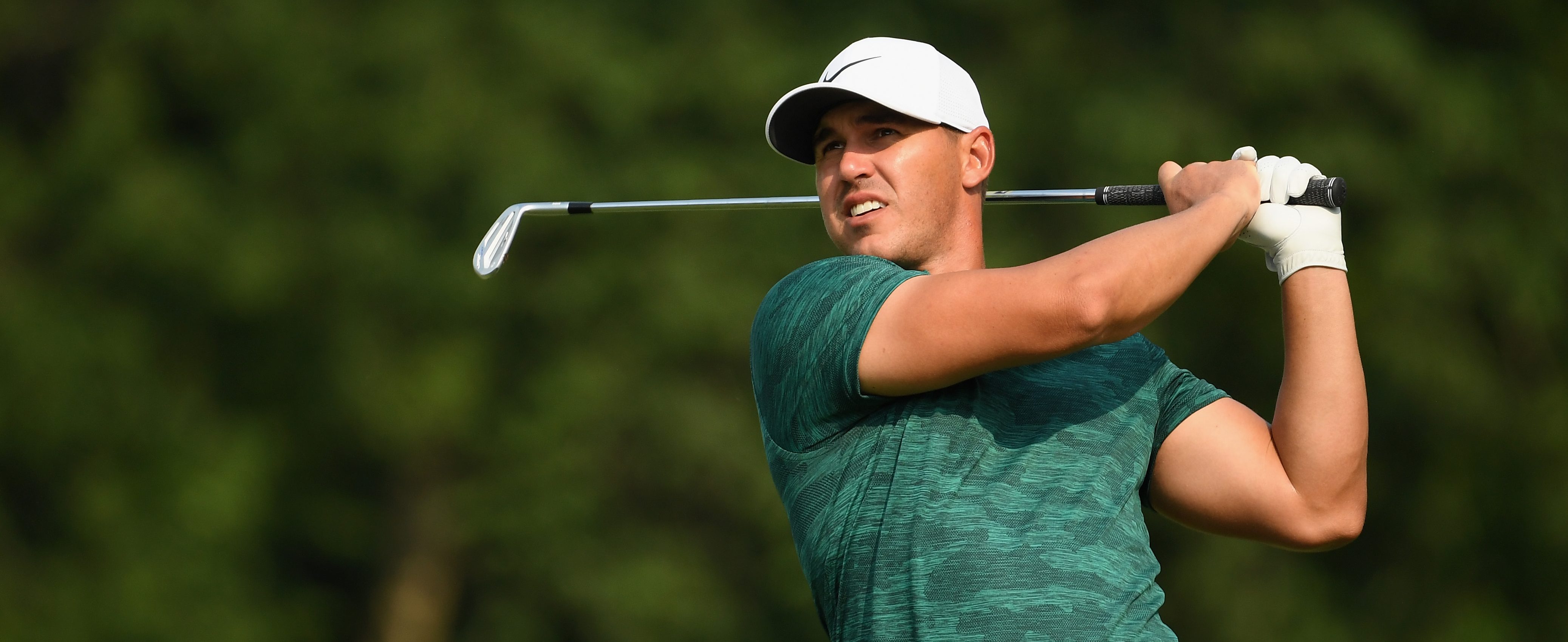 Brooks Koepka of the United States plays his shot from the 13th tee during the final round of the 2018 PGA Championship at Bellerive Country Club on August 12, 2018 in St Louis, Missouri.  (Photo by Ross Kinnaird/Getty Images)