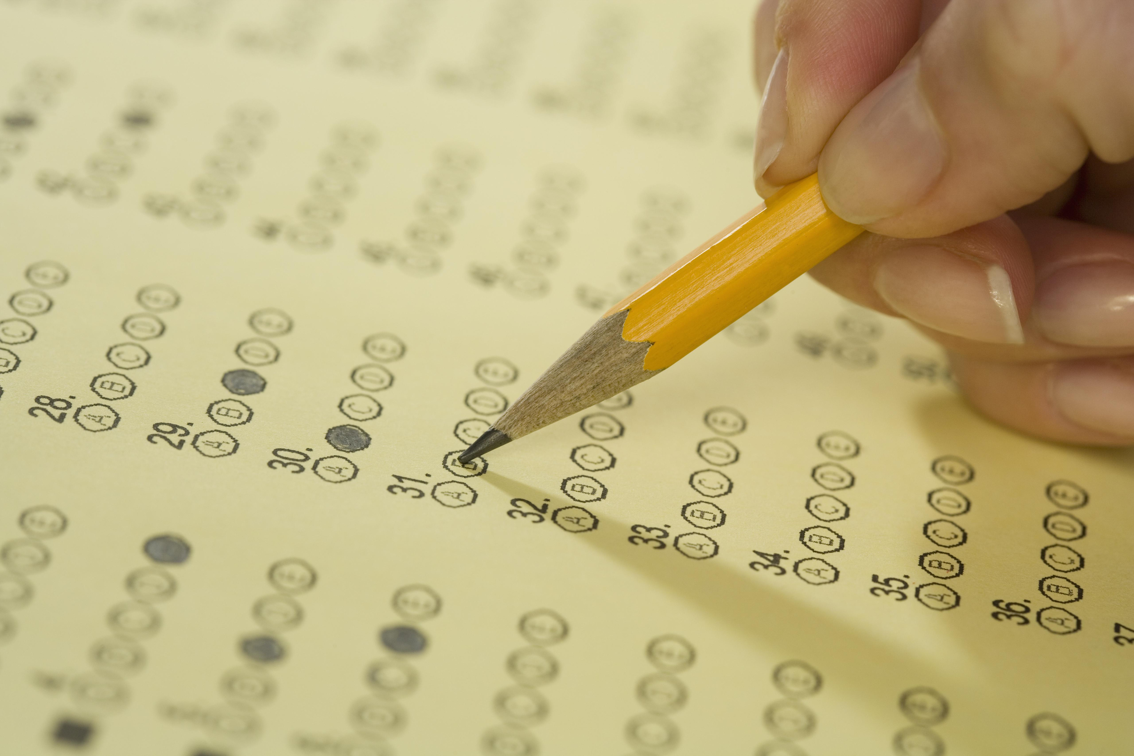 Filling in bubble test. Researchers have made a fuss recently about decreasing IQ scores. (Photo by Tetra Images/Getty Images). 