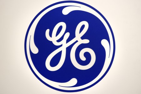 Logo of General Electric GE.  GE recently announced that it would be replacing current CEO John Flannery with H. Lawrence Culp. (Photo by Ulrich Baumgarten via Getty Images)
