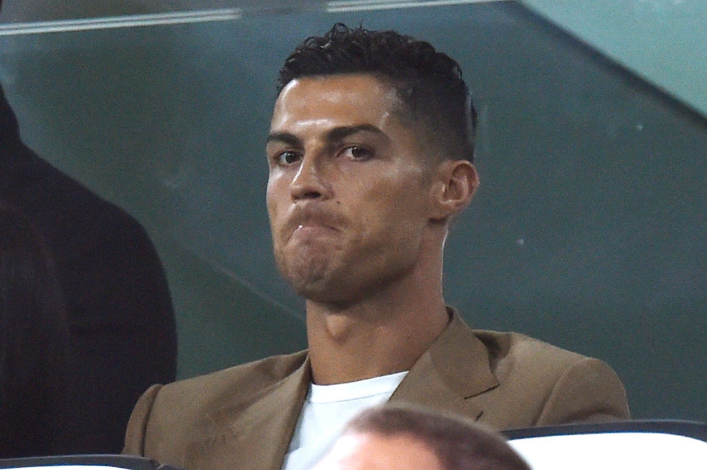 TURIN, ITALY - OCTOBER 02:  Cristiano Ronaldo of Juventus looks on in VIP standing during the Group H match of the UEFA Champions League between Juventus and BSC Young Boys at Allianz Stadium on October 2, 2018 in Turin, Italy.  (Photo by Tullio Puglia - UEFA/UEFA via Getty Images)