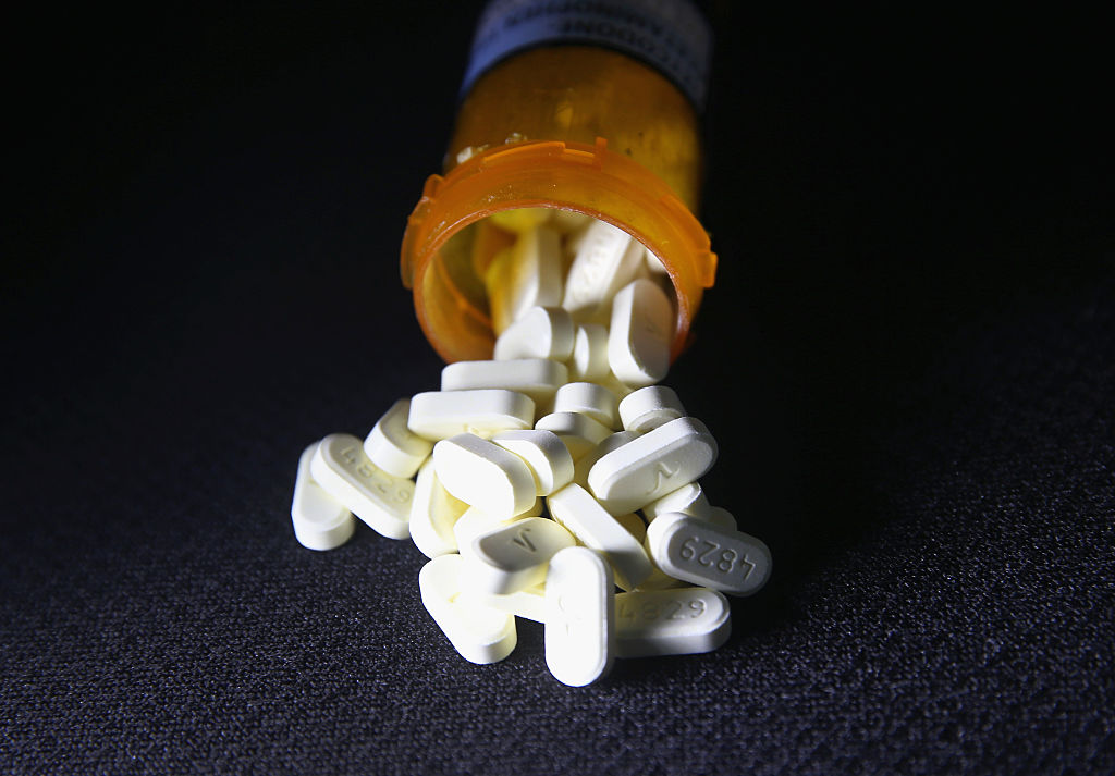 NORWICH, CT - MARCH 23:  Oxycodone pain pills prescribed for a patient with chronic pain lie on display on March 23, 2016 in Norwich, CT. Communities nationwide are struggling with the unprecidented opioid pain pill and heroin addiction epidemic. On March 15, the U.S. Centers for Disease Control (CDC), announced guidelines for doctors to reduce the amount of opioid painkillers prescribed, in an effort to curb the epidemic. The CDC estimates that most new heroin addicts first became hooked on prescription pain medication before graduating to heroin, which is stronger and cheaper.  (Photo by John Moore/Getty Images)