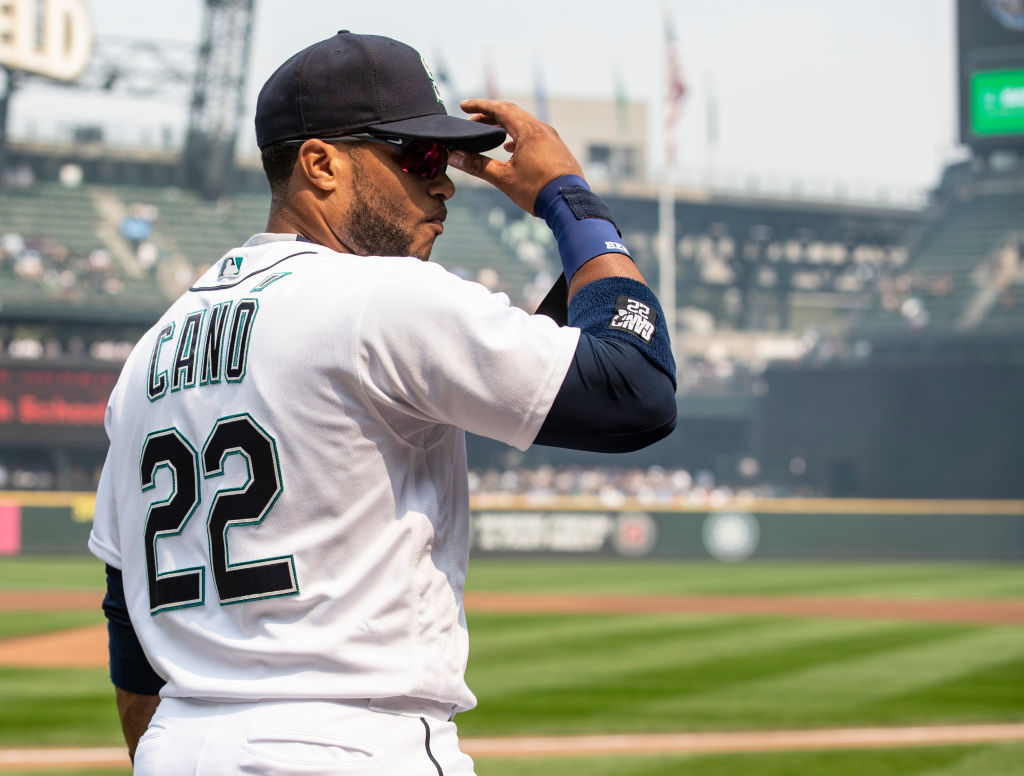 SEATTLE, WA - AUGUST 22: Robinson Cano #22 of the Seattle Mariners adjust his cap before a game at Safeco Field on August 22, 2018 in Seattle, Washington. The Astros won the game 10-7. (Photo by Stephen Brashear/Getty Images)