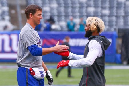 EAST RUTHERFORD, NJ - SEPTEMBER 09:  New York Giants quarterback Eli Manning (10) and New York Giants wide receiver Odell Beckham (13) shake hands prior to the National Football League game between the New York Giants and the Jacksonville Jaguars on September 9, 2018 at MetLife Stadium in East Rutherford, NJ.  (Photo by Rich Graessle/Icon Sportswire via Getty Images)
