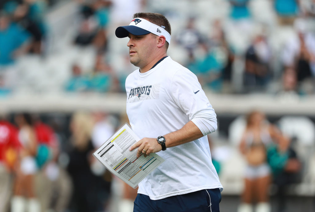 JACKSONVILLE, FL - SEPTEMBER 16:  New England Patriots offensive coordinator Josh McDaniels walks to the field before their game against the Jacksonville Jaguars at TIAA Bank Field on September 16, 2018 in Jacksonville, Florida.  (Photo by Scott Halleran/Getty Images)