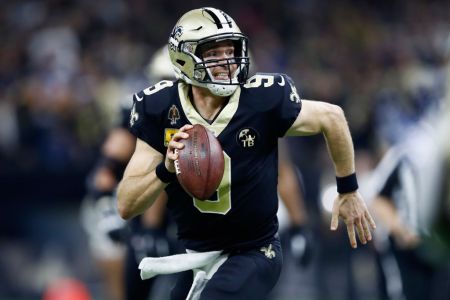 Quarterback Drew Brees #9 of the New Orleans Saints runs with the ball during the second quarter of the game against the Los Angeles Rams at Mercedes-Benz Superdome on November 4, 2018 in New Orleans, Louisiana.  (Photo by Wesley Hitt/Getty Images)