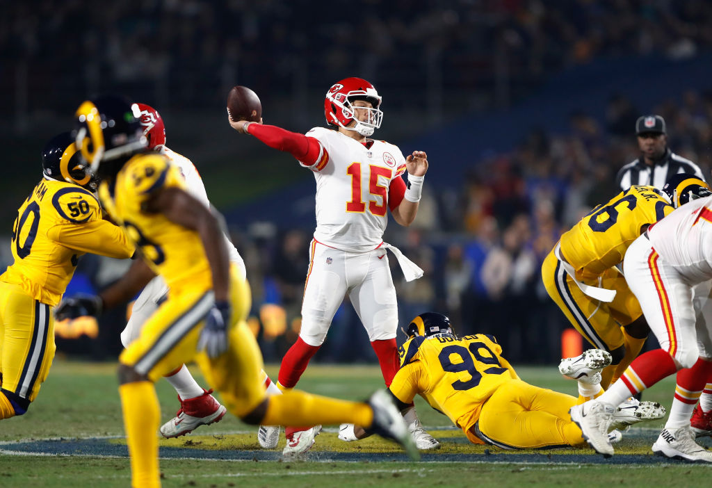 LOS ANGELES, CA - NOVEMBER 19:  Quarterback Patrick Mahomes #15 of the Kansas City Chiefs passes against the Los Angeles Rams in the second quarter of the game at Los Angeles Memorial Coliseum on November 19, 2018 in Los Angeles, California.  (Photo by Sean M. Haffey/Getty Images)