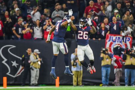 HOUSTON, TX - NOVEMBER 26: Houston Texans Quarterback Deshaun Watson (4) celebrates with Houston Texans Running Back Lamar Miller (26) following Miller's 97-yard rushing touchdown during the football game between the Tennessee Titans and Houston Texans on November 26, 2018 at NRG Stadium in Houston, Texas. (Photo by Ken Murray/Icon Sportswire via Getty Images)
