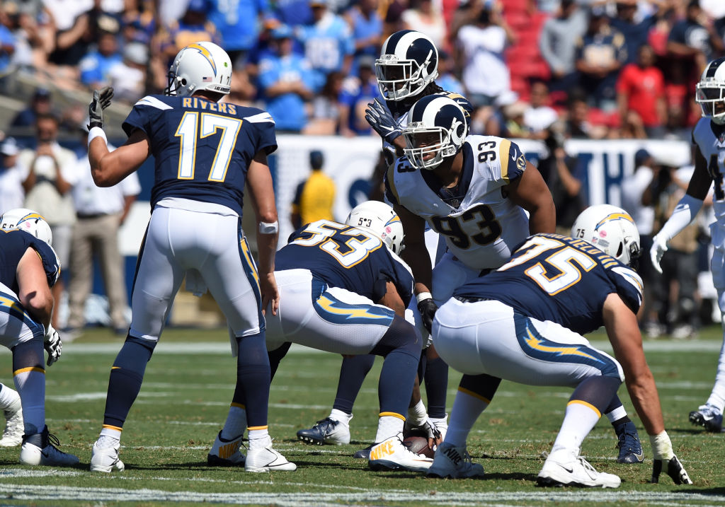 LOS ANGELES, CA - SEPTEMBER 23: Los Angeles Rams Nose Tackle Ndamukong Suh (93) stares down Los Angeles Chargers Quarterback Philip Rivers (17) during an NFL game between the Los Angeles Chargers and the Los Angeles Rams on September 23, 2018, at the Los Angeles Memorial Coliseum in Los Angeles, CA. (Photo by Chris Williams/Icon Sportswire via Getty Images)
