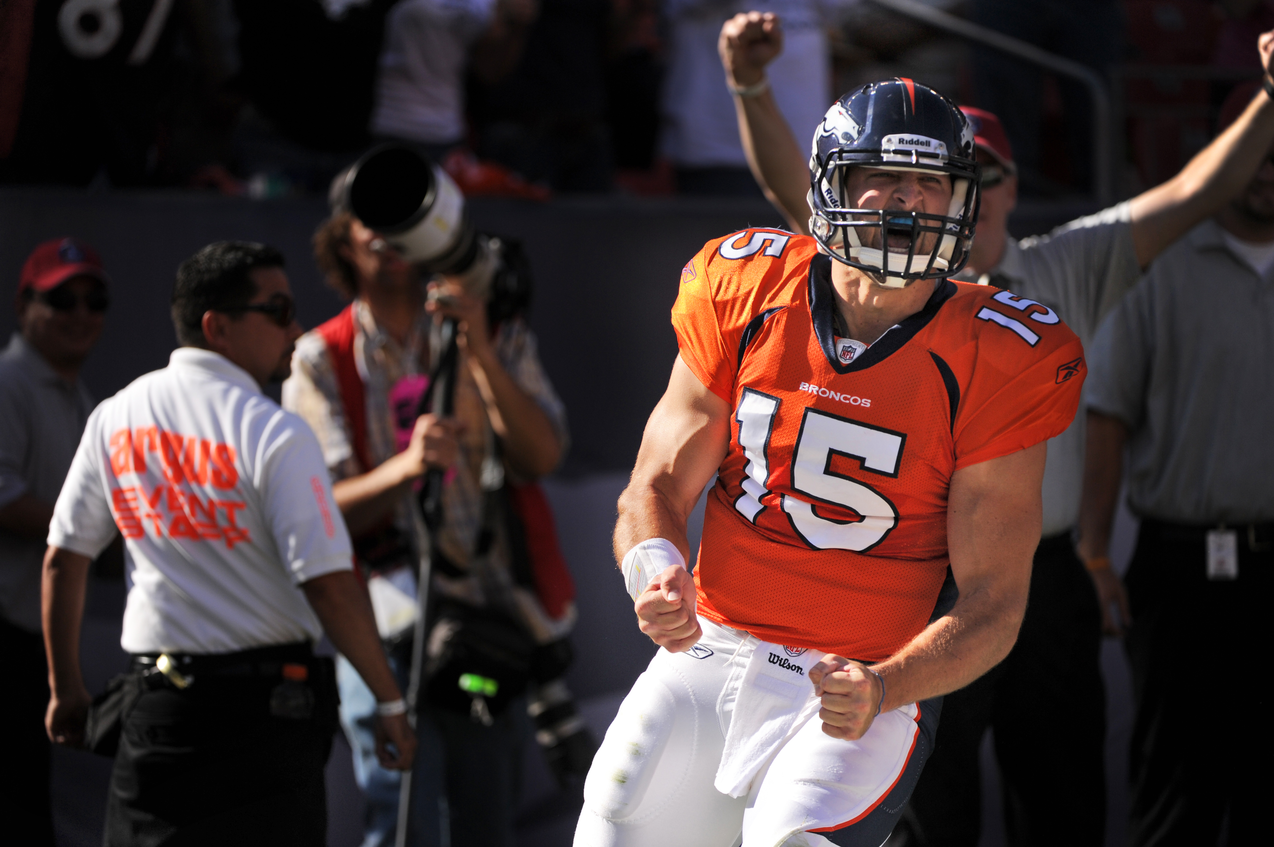 Denver Broncos quarterback Tim Tebow runs the ball in for a touchdown during the second quarter of play against New York Jets Sunday October 17, 2010 at Invesco Field at Mile High. Photo by Joe Amon, The Denver Post  (Photo By Joe Amon/The Denver Post via Getty Images)