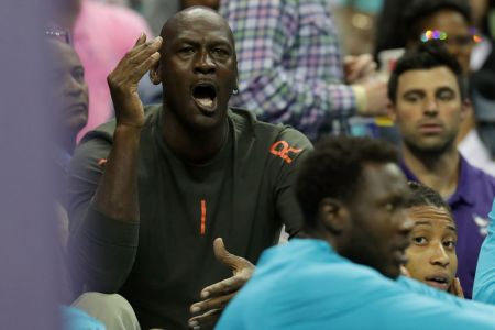 CHARLOTTE, NC - OCTOBER 13:  Michael Jordan, owner of the Charlotte Hornets reacts on the bench during their game against the Dallas Mavericks at Spectrum Center on October 13, 2017 in Charlotte, North Carolina. (Photo by Streeter Lecka/Getty Images)