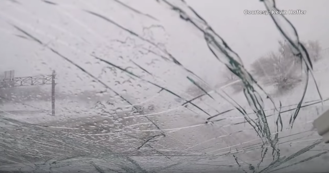 Falling snow cracked one commuter's windshield (Kevin Hoffer)