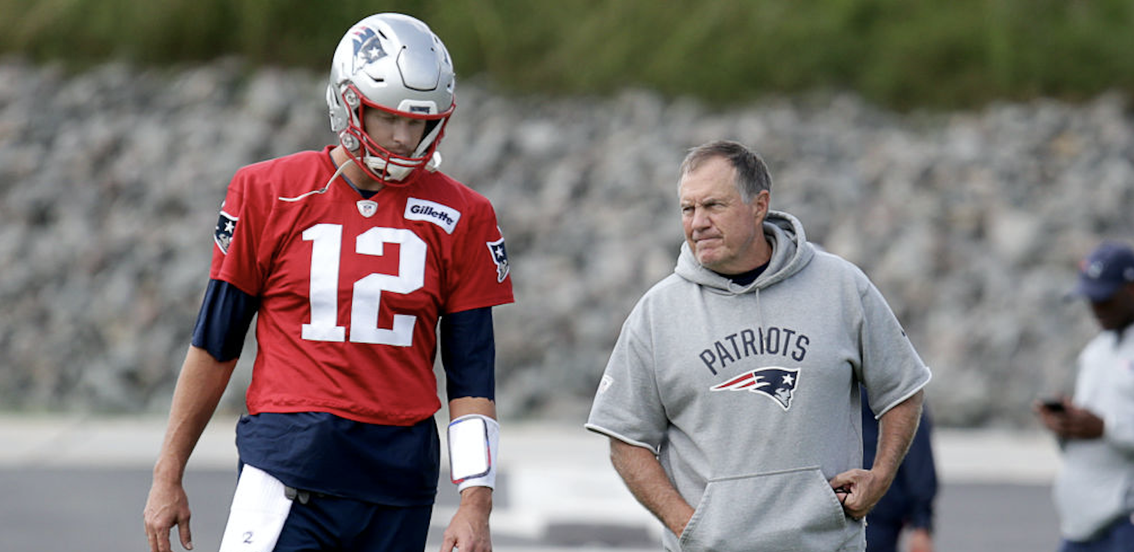 New England Patriots quarterback Tom Brady (12) walks with New England Patriots head coach Bill Belichick during New England Patriots practice at the Gillette Stadium practice facility in Foxborough, MA on Sep. 21, 2018. (Photo by Jonathan Wiggs/The Boston Globe via Getty Images)