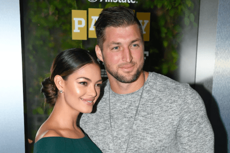 SAN JOSE, CA - JANUARY 05: (L-R) Miss Universe 2017 Demi-Leigh Nel-Peters and Tim Tebow of ESPN attend the Party At The Playoff at The GlassHouse on January 5, 2019 in San Jose, California. (Photo by Steve Jennings/Getty Images for ESPN)