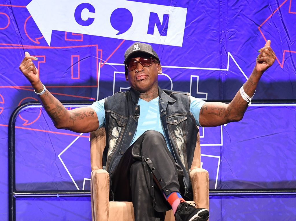 Basketball star Dennis Rodman (R) addresses the crowd on North Korea during the "Slam Dunk Diplomacy with Dennis Rodman" panel at the 2018 Politicon in Los Angeles, California on October 20, 2018. - The two day event covers all things political with dozens of high profile political figures. (Photo by Mark RALSTON / AFP)        (Photo credit should read MARK RALSTON/AFP/Getty Images)