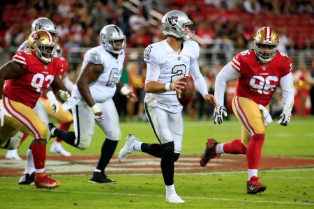 SANTA CLARA, CA - NOVEMBER 01: AJ McCarron #2 of the Oakland Raiders rolls out against the San Francisco 49ers at Levi's Stadium on November 1, 2018 in Santa Clara, California. (Photo by Daniel Shirey/Getty Images)