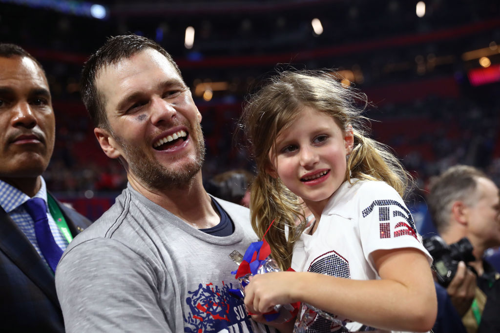 Tom Brady #12 of the New England Patriots celebrates with Vivian Lake Brady after his 13-3 win against Los Angeles Rams during Super Bowl LIII at Mercedes-Benz Stadium on February 03, 2019 in Atlanta, Georgia. (Photo by Maddie Meyer/Getty Images)