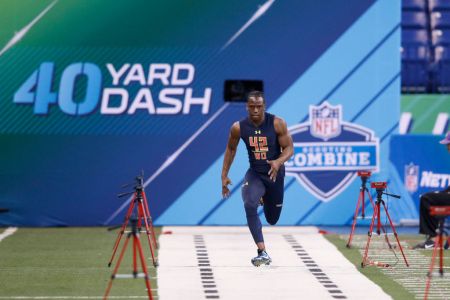 INDIANAPOLIS, IN - MARCH 04: Wide receiver John Ross of Washington runs the 40-yard dash in an unofficial record time of 4.22 seconds during day four of the NFL Combine at Lucas Oil Stadium on March 4, 2017 in Indianapolis, Indiana. (Photo by Joe Robbins/Getty Images)