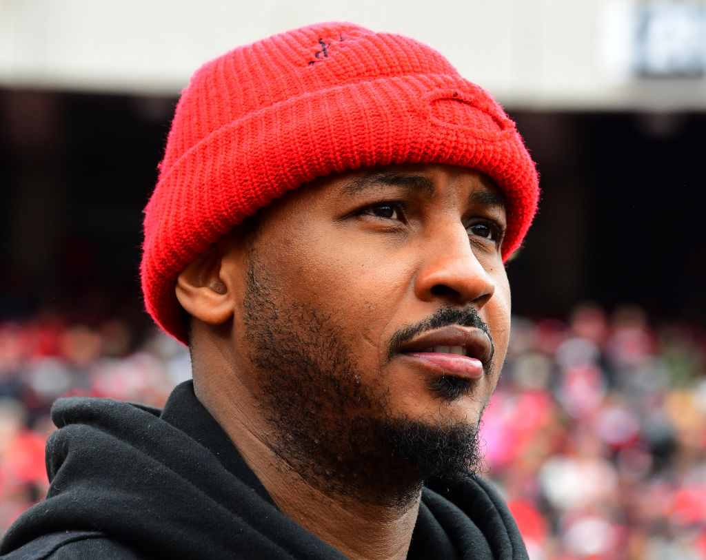ATHENS, GA - NOVEMBER 24: NBA free agent Carmelo Anthony watches play from the sidelines between the Georgia Bulldogs and the Georgia Tech Yellow Jackets on November 24, 2018 at Sanford Stadium in Athens, Georgia. (Photo by Scott Cunningham/Getty Images)