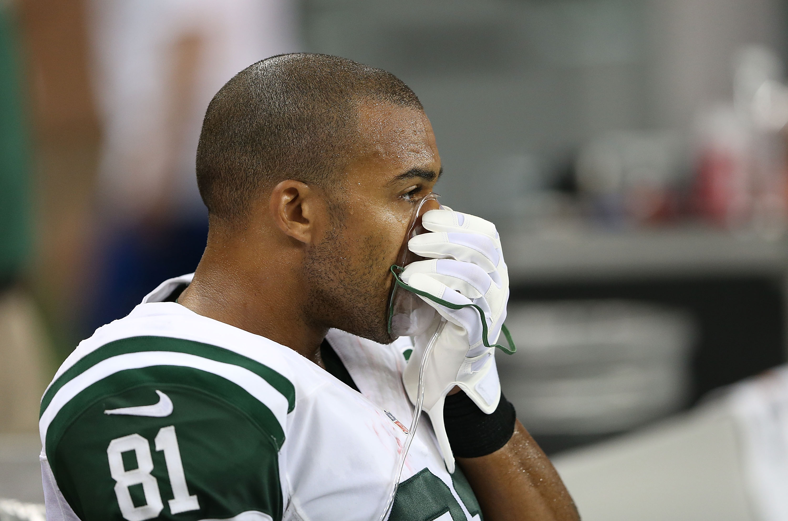 DETROIT, MI - AUGUST 09: Kellen Winslow #81 of the New York Jets takes some oxygen during the pre-season game against the Detroit Lions at Ford Field on August 9, 2013 in Detroit, Michigan. (Photo by Leon Halip/Getty Images)