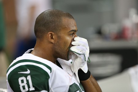 DETROIT, MI - AUGUST 09: Kellen Winslow #81 of the New York Jets takes some oxygen during the pre-season game against the Detroit Lions at Ford Field on August 9, 2013 in Detroit, Michigan. (Photo by Leon Halip/Getty Images)