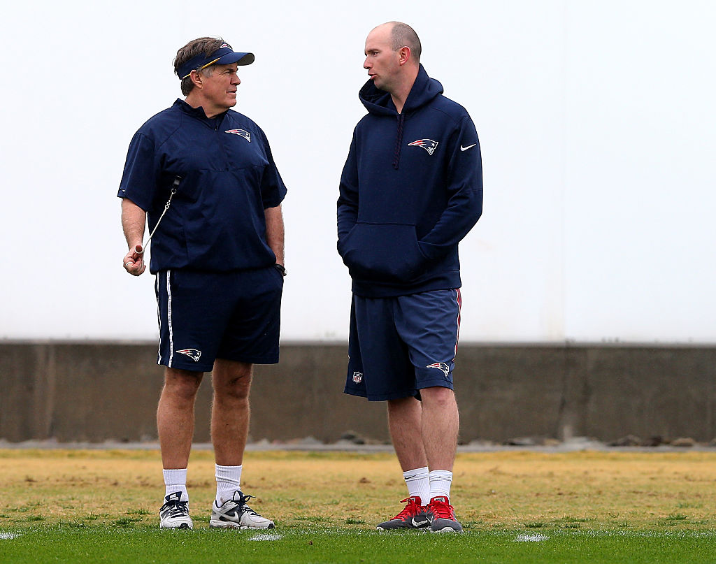 TEMPE, AZ - JANUARY 30:  Head coach Bill Belichick of the New England Patriots talks with Jack Easterby during the New England Patriots Super Bowl XLIX Practice on January 30, 2015 at the Arizona Cardinals Practice Facility in Tempe, Arizona.  (Photo by Elsa/Getty Images)