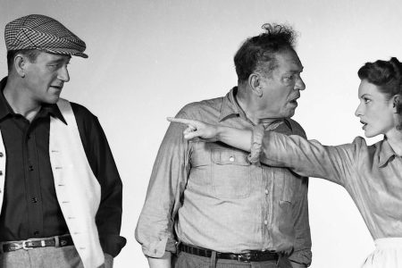 From left to right, actors John Wayne (1907 - 1979) as Sean Thornton, Victor McLaglen (1886 - 1959) as Squire 'Red' Will Danaher and Maureen O'Hara (1920 - 2015) as Mary Kate Danaher in a publicity still for the film 'The Quiet Man', 1952.  (Photo by Silver Screen Collection/Getty Images)