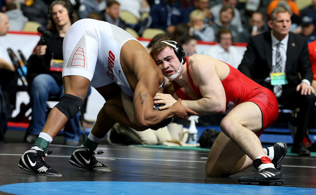 Maxwell Dean of the Cornell Big Red wrestles Myles Martin of OSU. (Photo by Justin K. Aller/NCAA Photos via Getty Images)