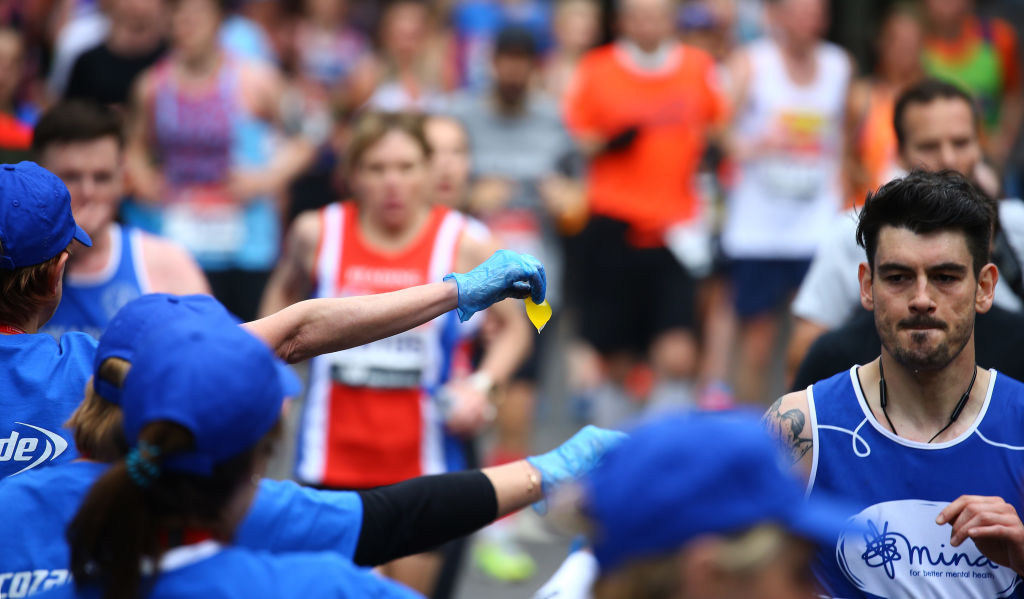 Seaweed capsules filled with energy drink are handed out at London Marathon. (Getty Images)
