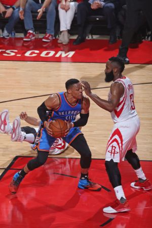 Westbrook guarded by James Harden. (Layne Murdoch/NBAE via Getty)
