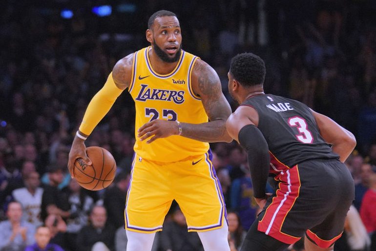 LeBron James guarded by Dwyane Wade. (Harry How/Getty Images)