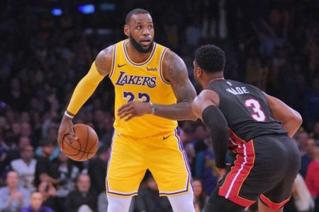 LeBron James guarded by Dwyane Wade. (Harry How/Getty Images)