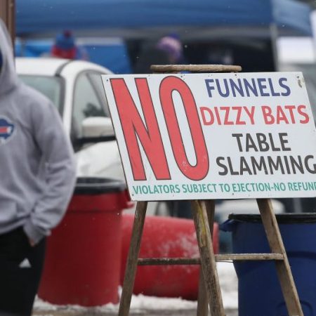 A sign notes the prohibiting table slamming. (Tom Szczerbowski/Getty)