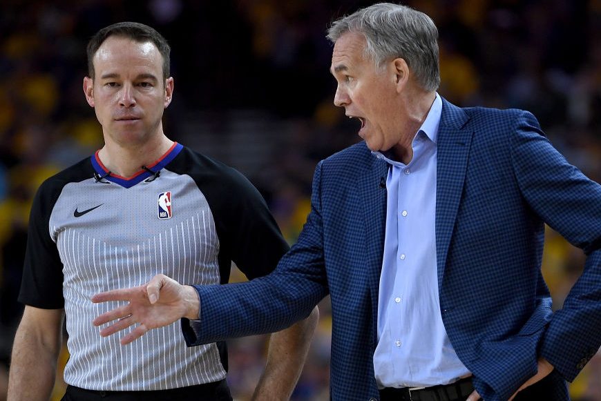 Mike D'Antoni of the Rockets complains to a ref. (Thearon W. Henderson/Getty)