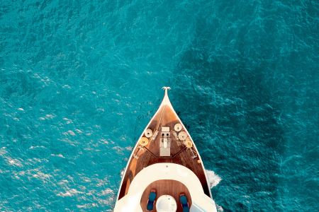 Want to get paid to hang out on a yacht? Same.