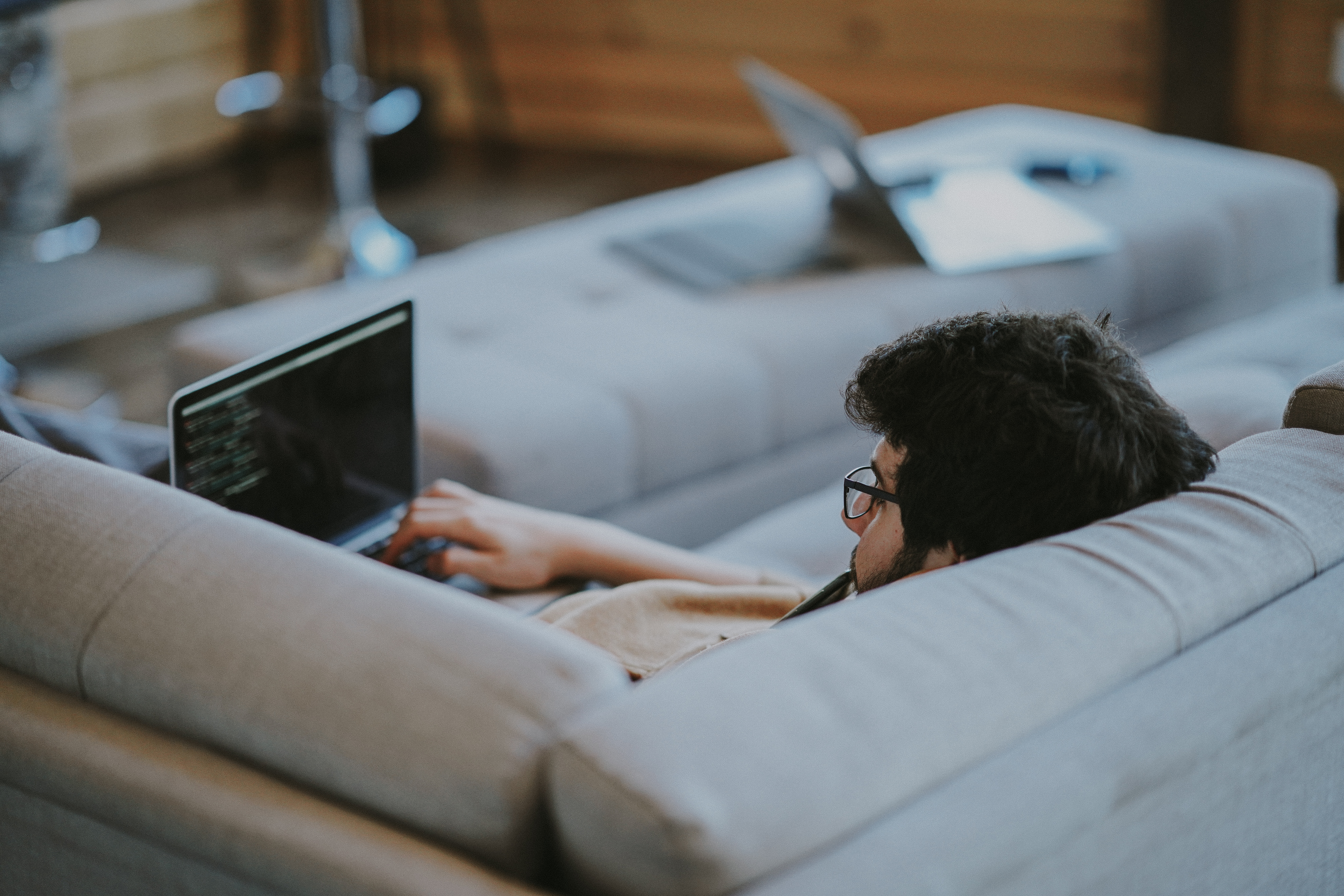 guy slouching on computer