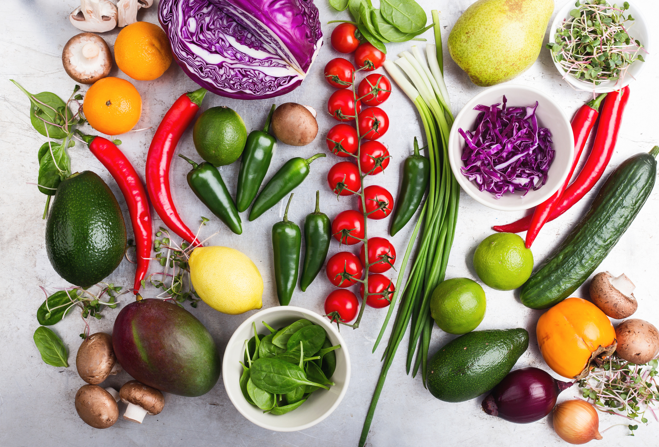Selection of fresh  vegetables and fruits viewed from above.