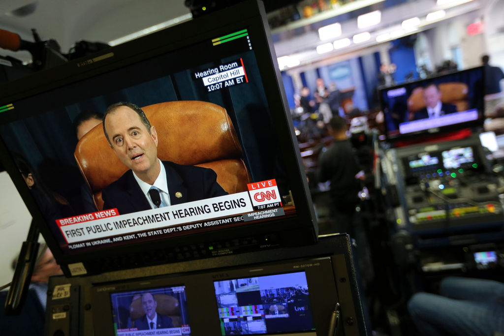 Members of the media watch the first public impeachment hearing in the Brady Press Briefing Room of the White House on November 13, in Washington, DC.
(Photo by Oliver Contreras/For The Washington Post via Getty Images)