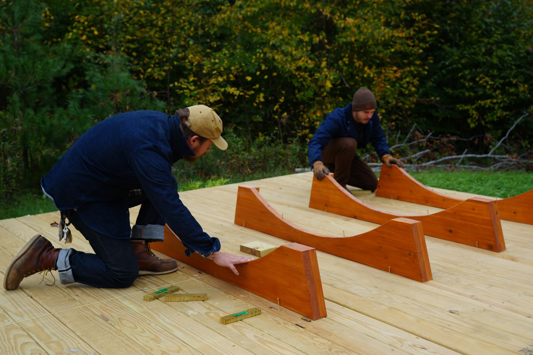 <strong>Building the Foundation and Platform</strong><br>“Unless you want to be lifting up the sauna itself and changing out the trusses that hold it in place every number of years, you need to have some sort of platform. Some people will bring in gravel and some people pour a concrete pad. In my case, I wanted it to be off the ground because it’s in the woods, so it's a foot or so up on a pressure-treated deck platform and leveled. In the summer, you can throw a couple of lawn chairs and put down towels ... it extends the use factor in that you can go in and out of it. And it also lengthens the life of those truss boards.”