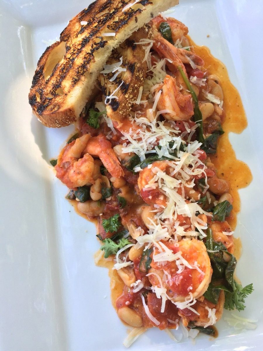 <strong>Garlic Shrimp in White Bean Ragu</strong><br>“This dish came along because I wanted to just do something different,” Ingraham says. “I wanted to do some type of ragu. Dwyane is into this dish as well. He was never been really big on seafood, but I wanted him to try the shrimp. But I wanted to do it with the beans to provide a little more protein for him. Then, with the addition of the kale in there, that was my way of getting him to eat some vegetables.”